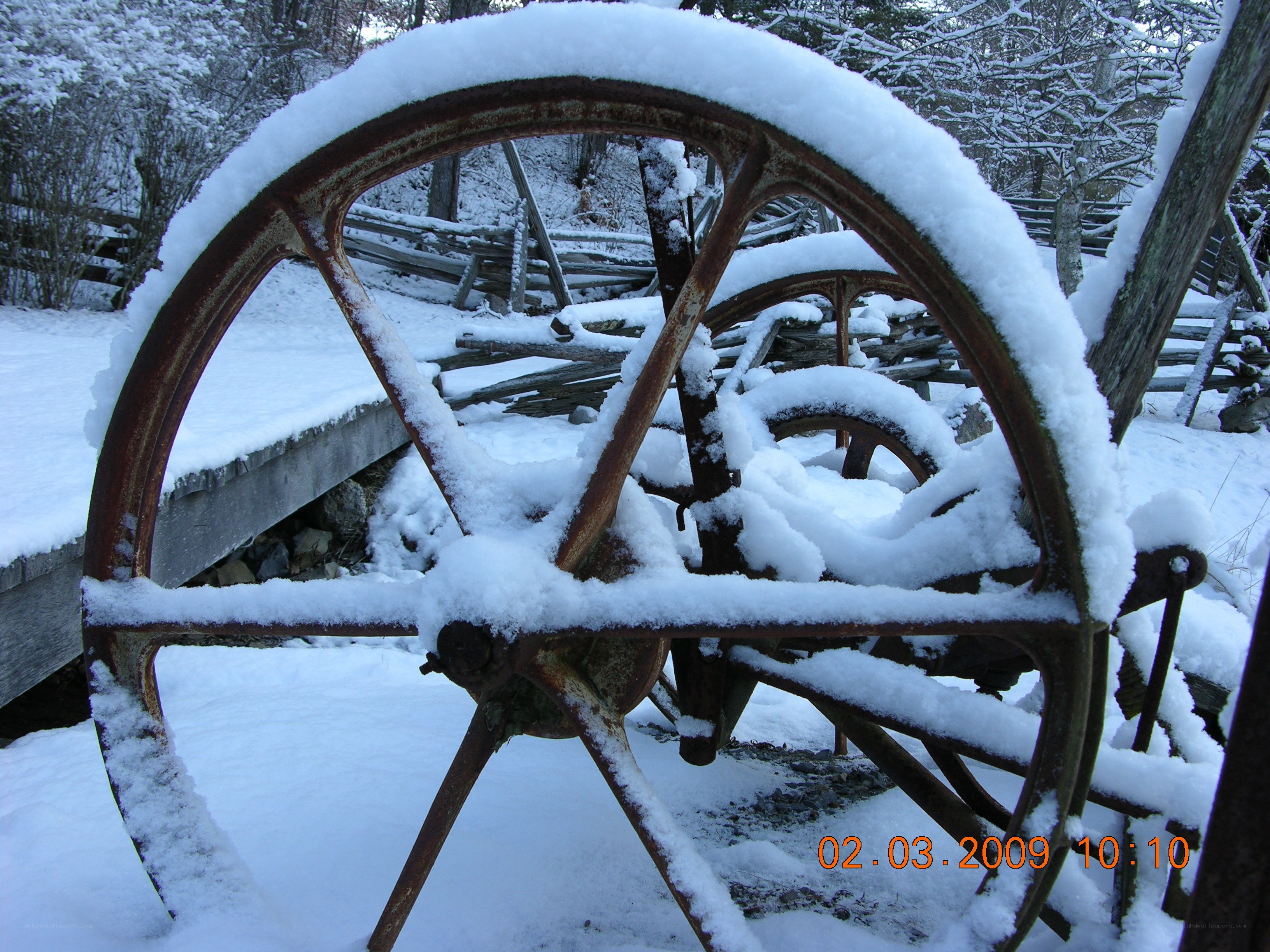 Snow-covered wagon wheels