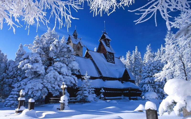 Snow-covered wooden church