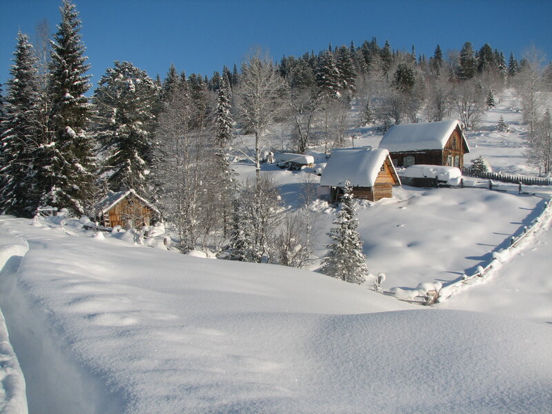 Snow-covered Wooden Houses