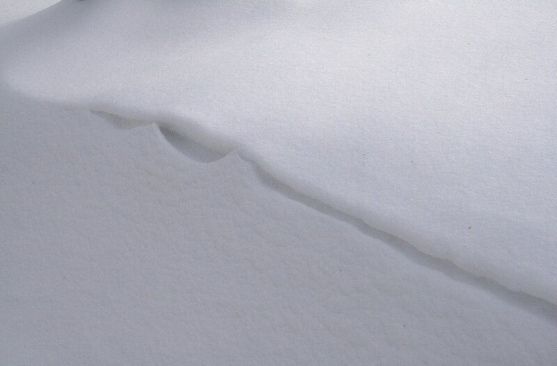 snow drift with footprints