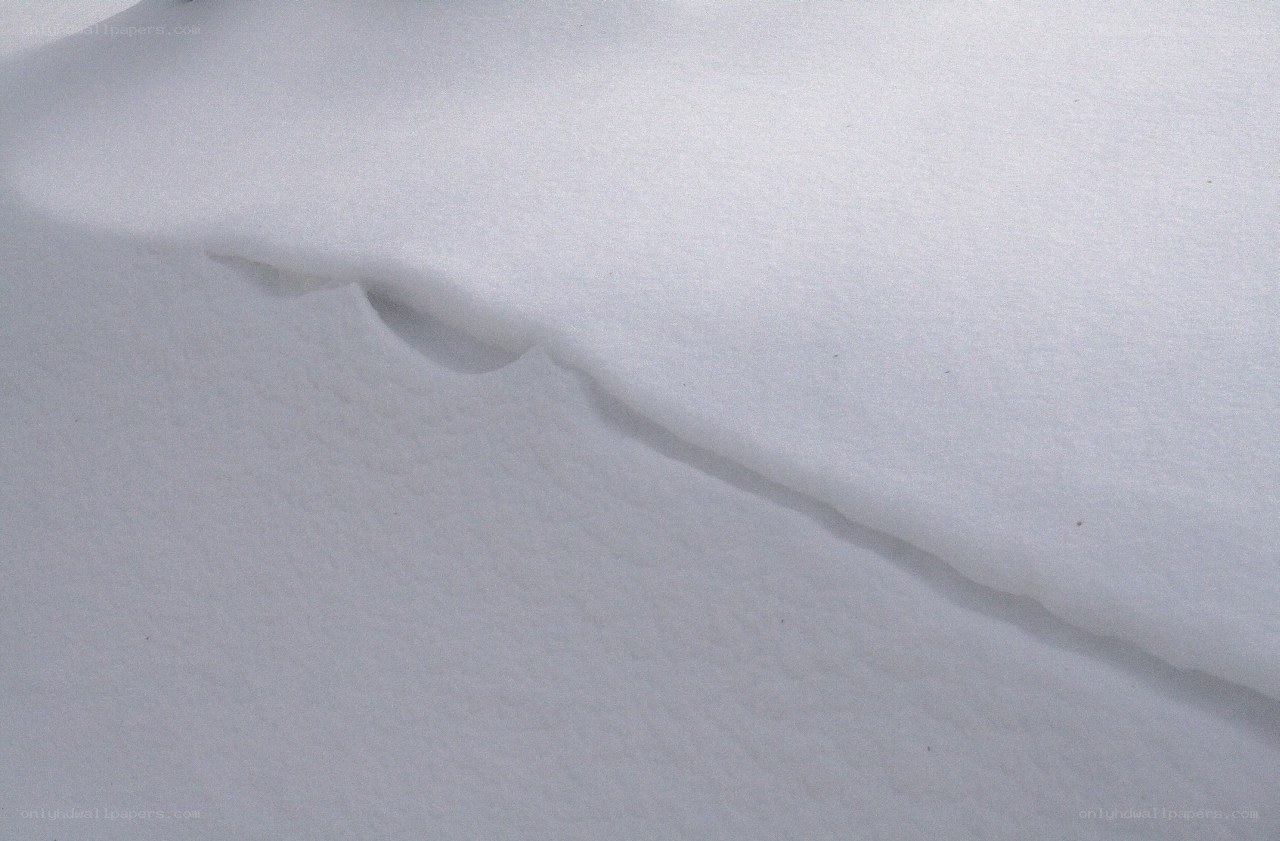 snow drift with footprints