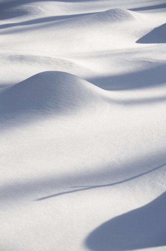Snow dunes in sunlight