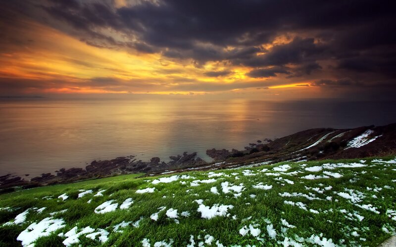 Snow-dusted Grassy Hill — Green, Dramatic