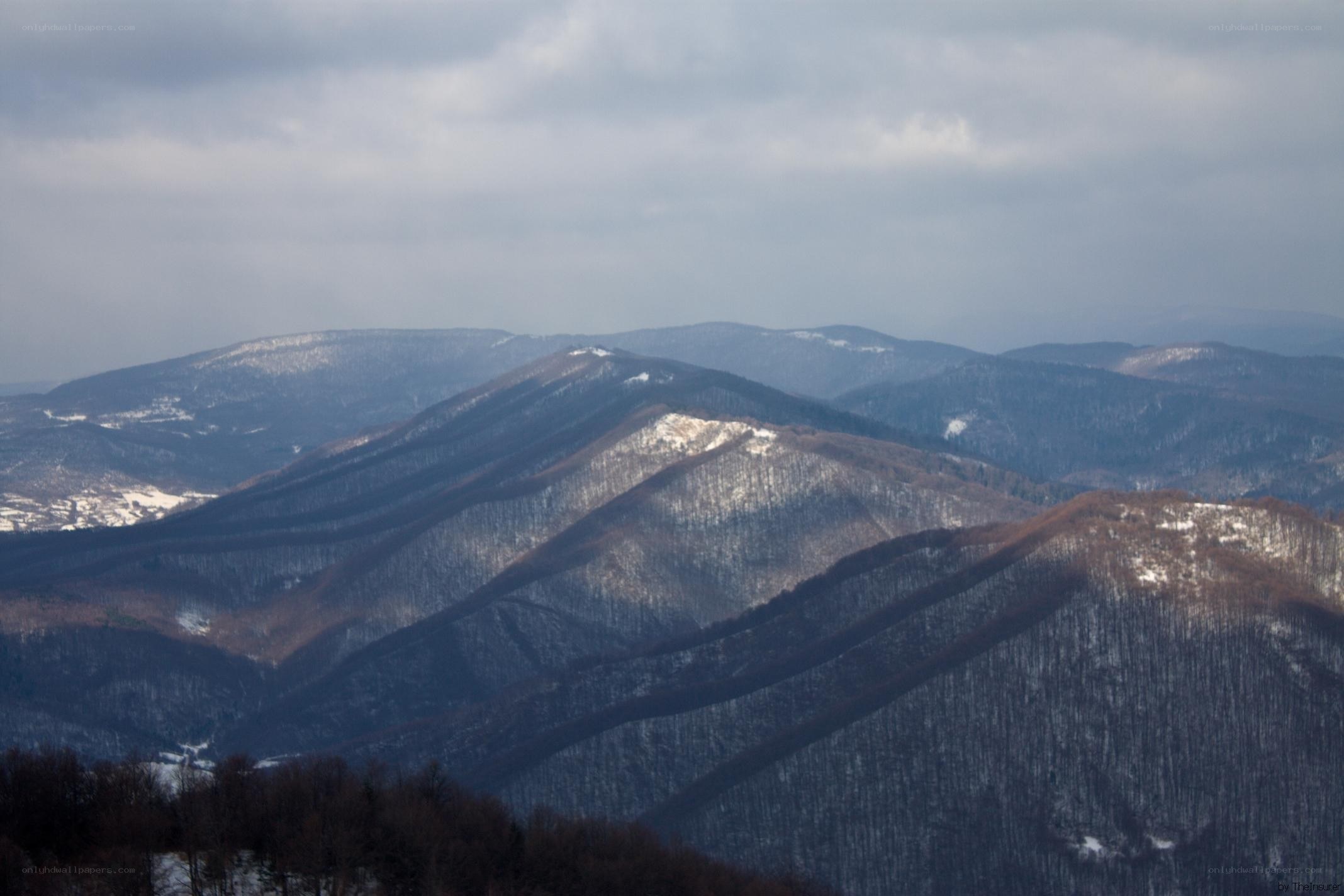 Snow-dusted mountain ranges