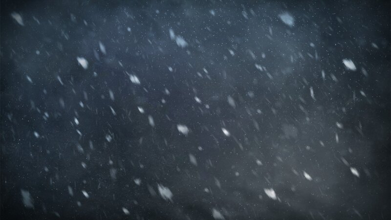 snow falling at night