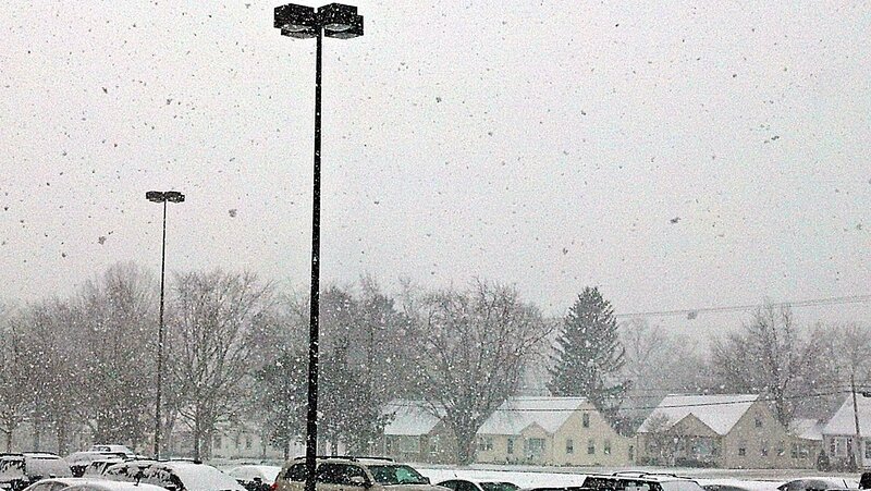 Snow Falling in Parking Lot