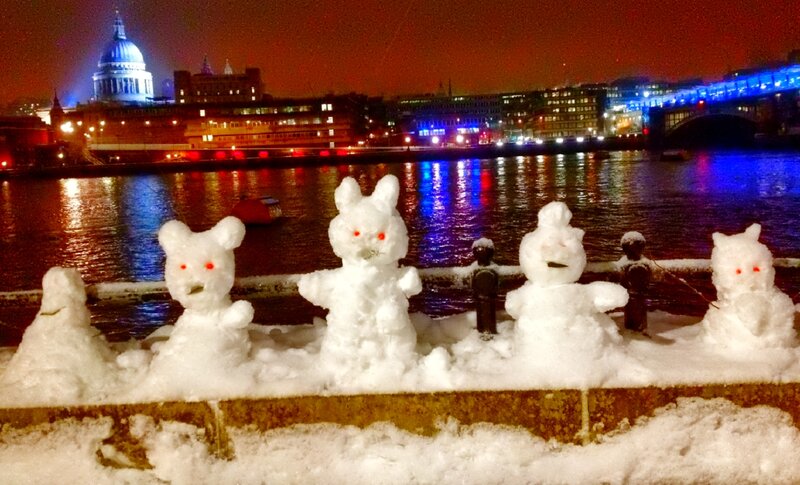 Snow Figures on Riverbank