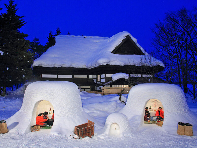 Snow Huts with People