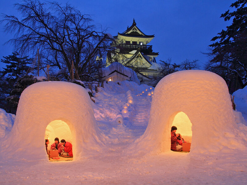 Snow Huts with People — White