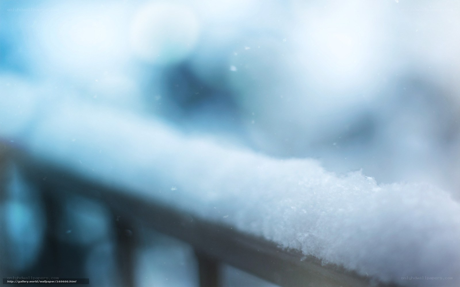 Snow on a railing