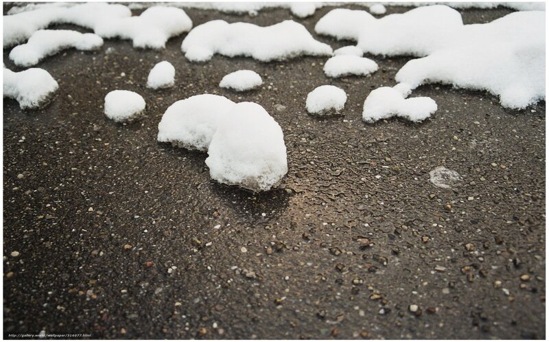 Snow patches on pavement