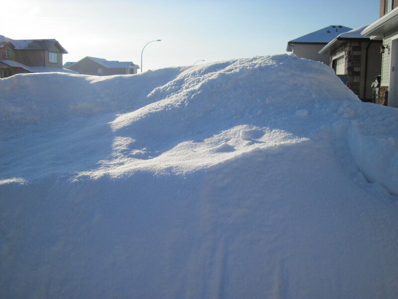 Snow Pile in Driveway — White