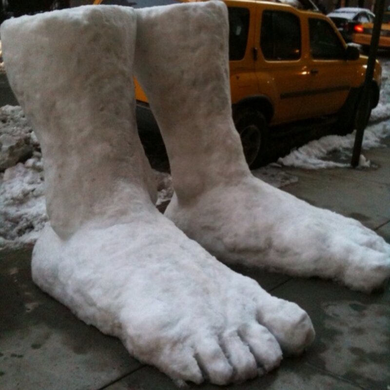 snow sculpture of feet