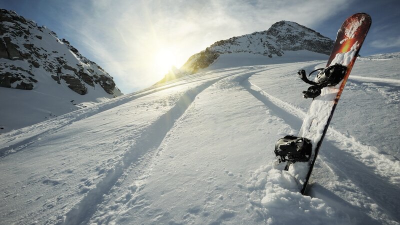 Snowboard on Snowy Slope — White