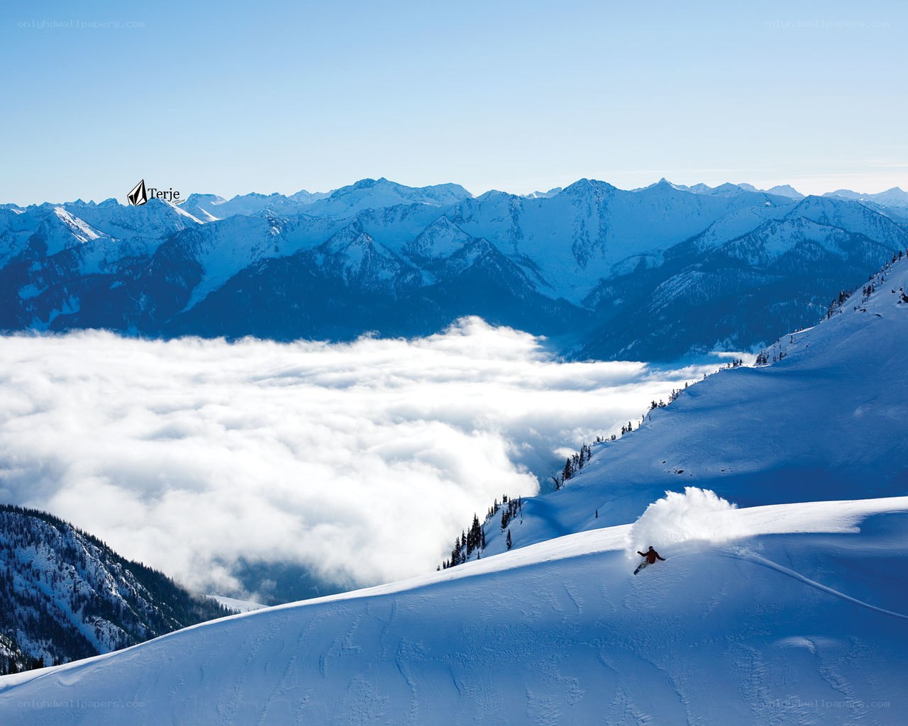 Snowboarder above the clouds
