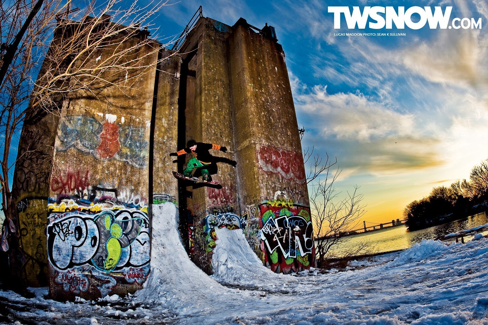 Snowboarder at graffiti wall