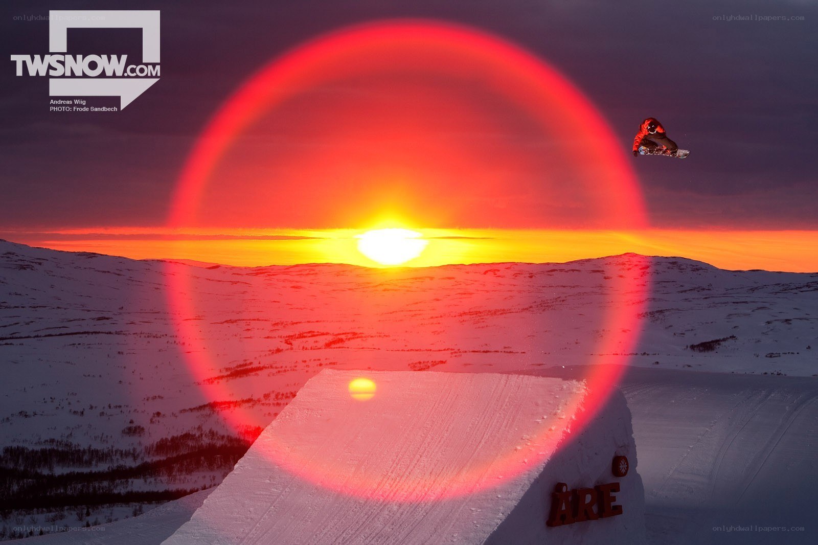Snowboarder at sunset