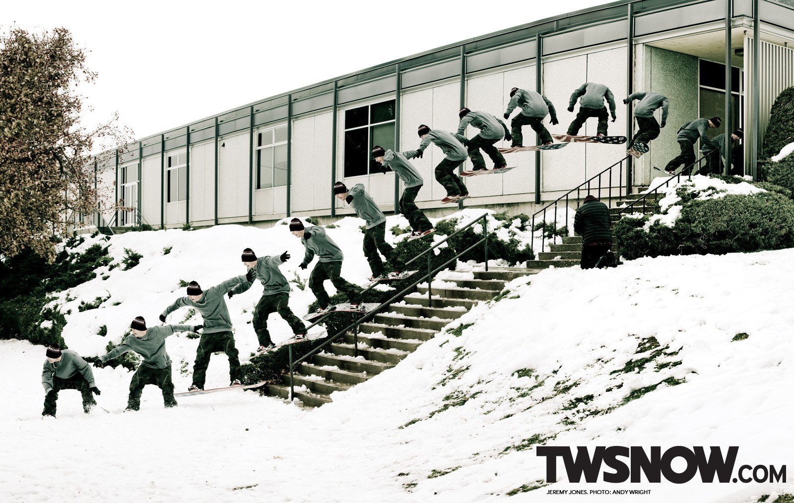 Snowboarder descending stairs