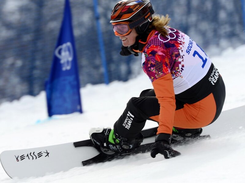 Snowboarder in Action — White, Focused