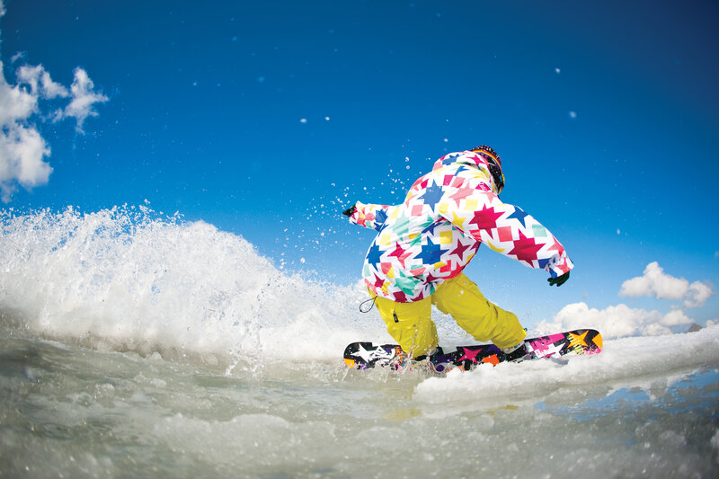 Snowboarder in colorful gear