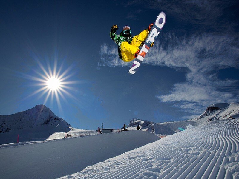 Snowboarder in Mid-air — Blue, Dramatic, Afternoon, Photograph, Mountain, Sun, Skier
