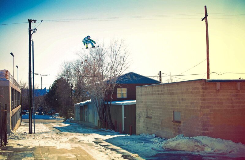 Snowboarder in Mid-air — Blue, Dramatic, Winter, Photograph, Buildings