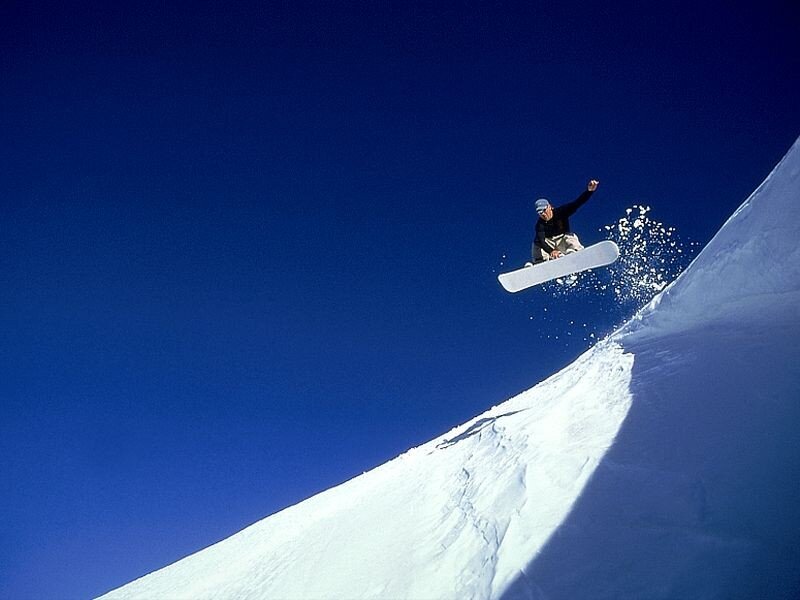 Snowboarder in Mid-air — Blue, Dramatic, Winter, Photograph, Snow, Sky, Snowboard
