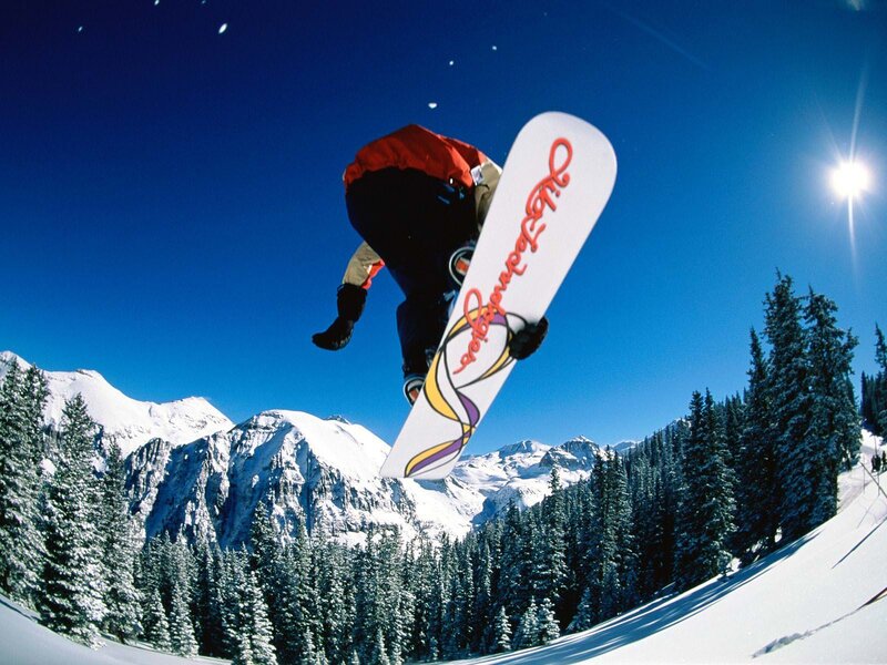 Snowboarder in Mid-air — Blue, Dynamic, Winter, Photograph, Mountains, Trees