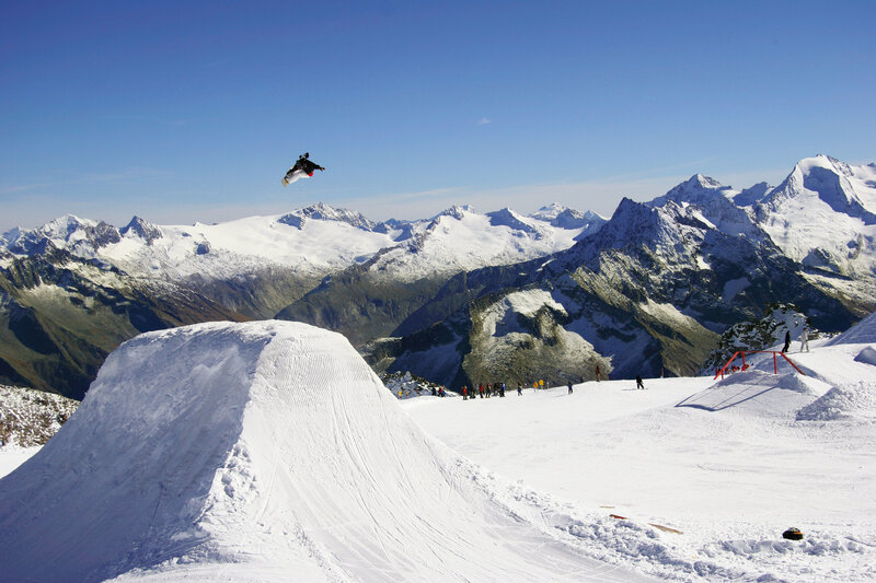Snowboarder in mid-air jump