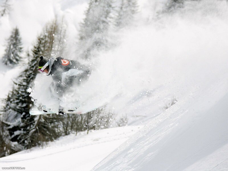 Snowboarder in mid-air jump