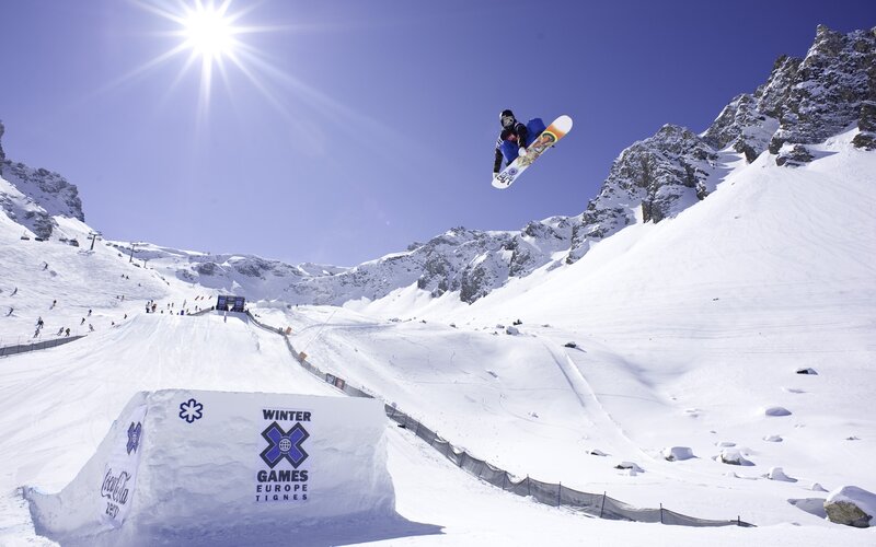 Snowboarder in mid-air jump