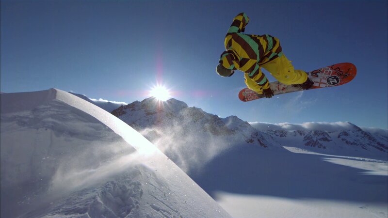 Snowboarder in mid-air jump