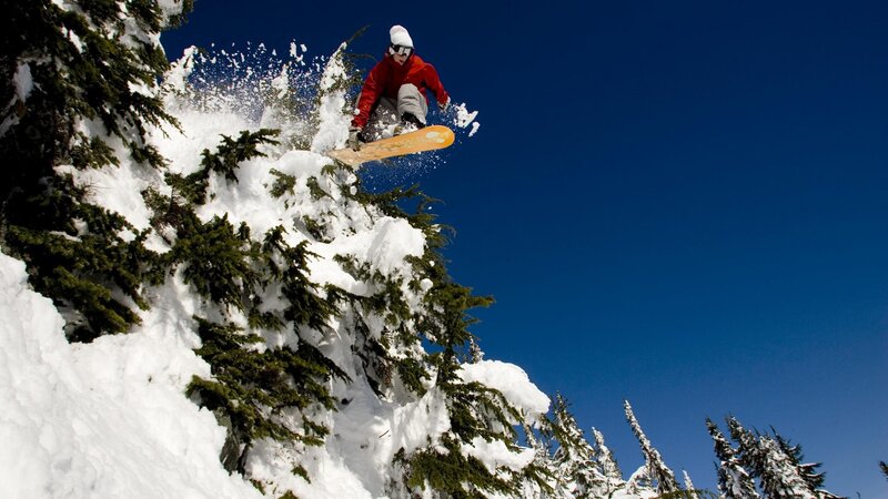 Snowboarder in mid-air jump