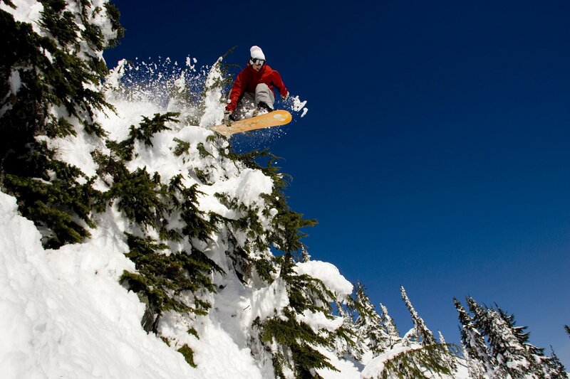 Snowboarder in mid-air jump
