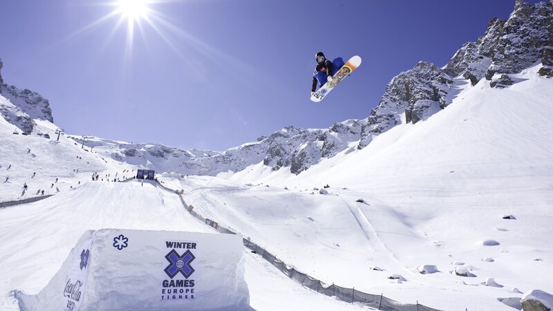 Snowboarder in mid-air jump