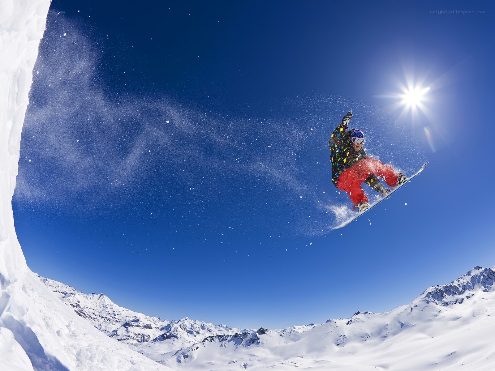 Snowboarder in mid-air jump