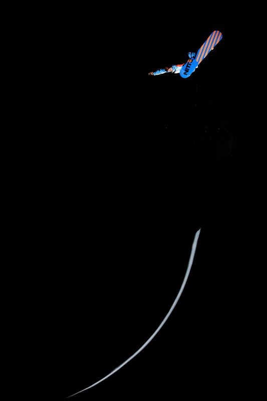 Snowboarder in mid-air jump