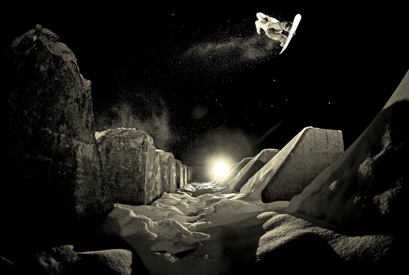 Snowboarder in mid-air jump