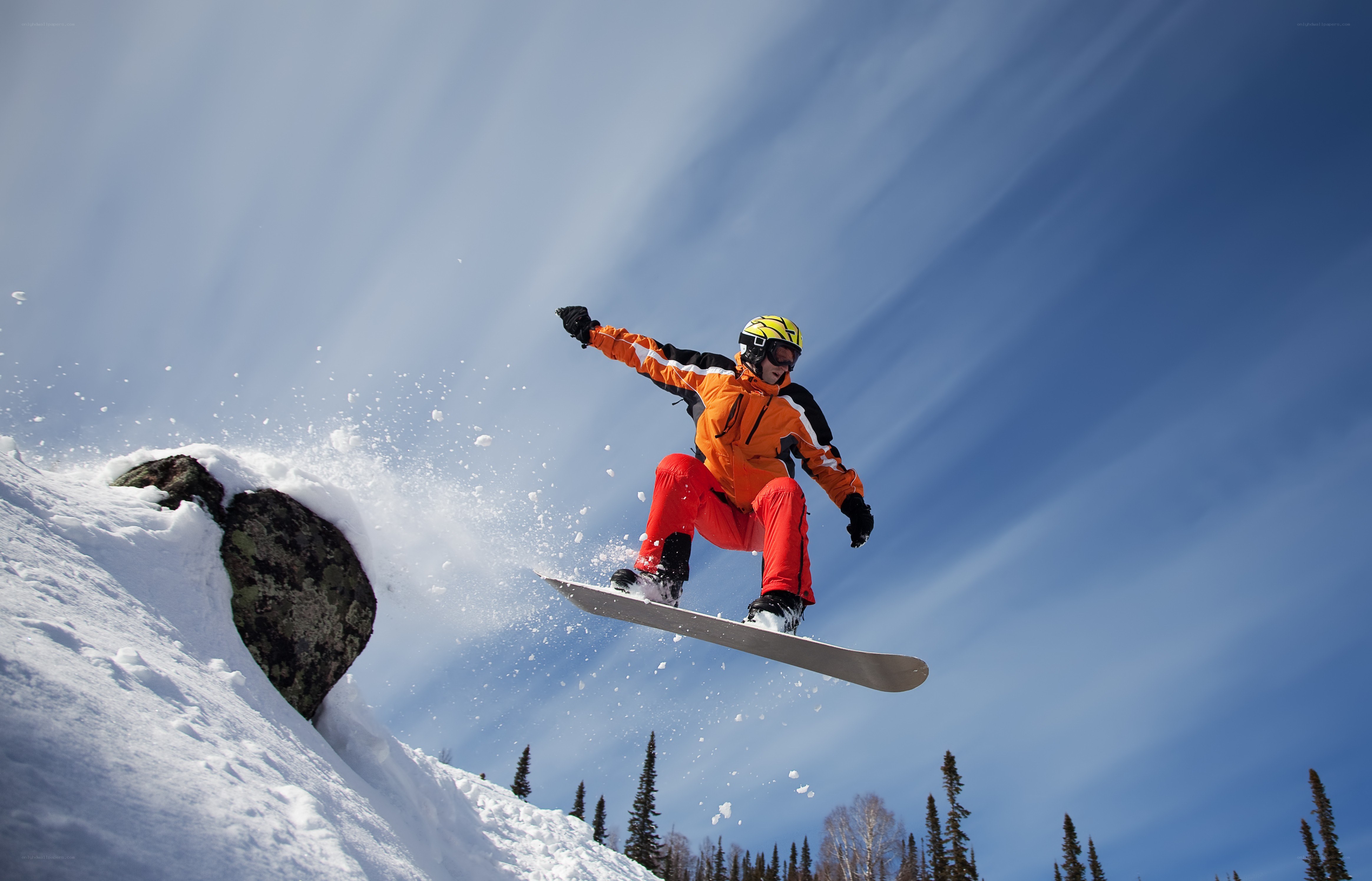 Snowboarder in mid-air jump