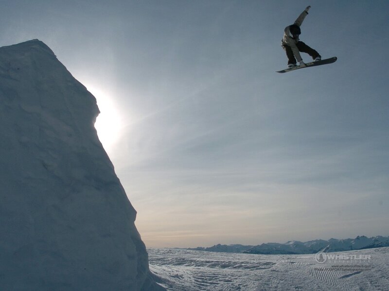 snowboarder in mid-air jump
