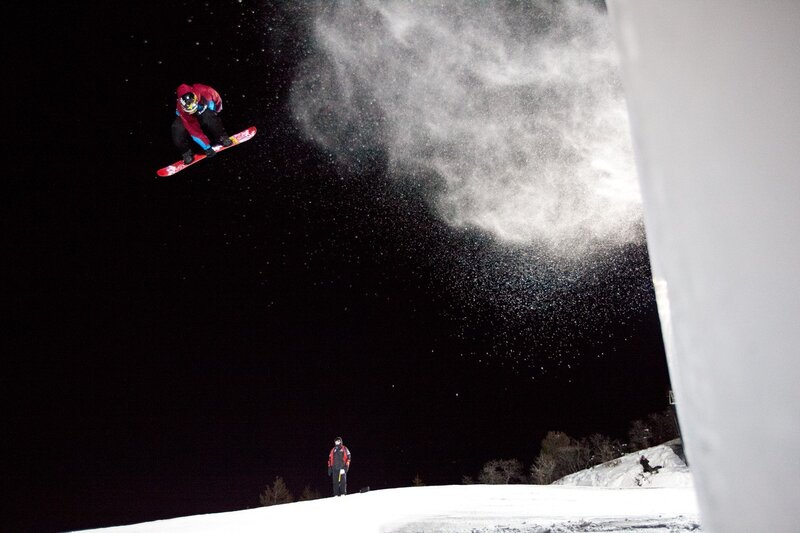 Snowboarder in mid-air jump