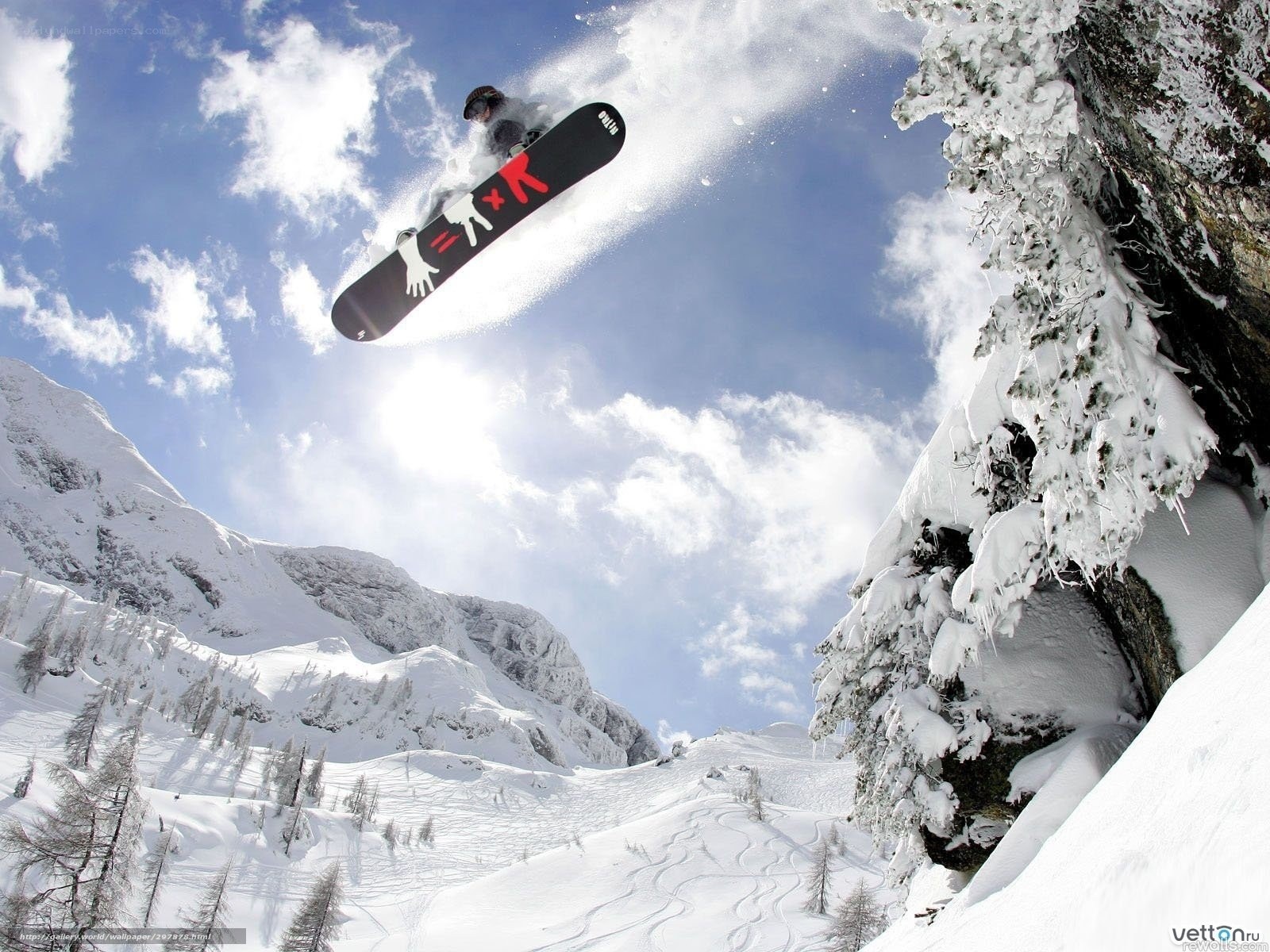 Snowboarder in mid-air jump