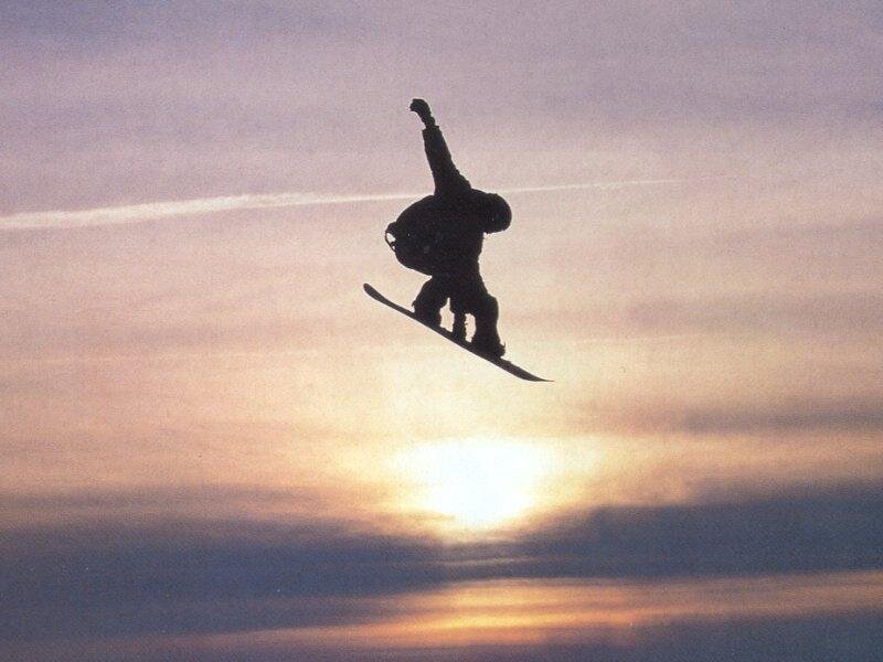 snowboarder in mid-air jump