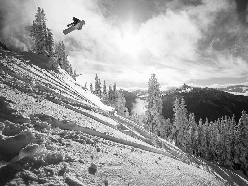 Snowboarder in mid-air jump
