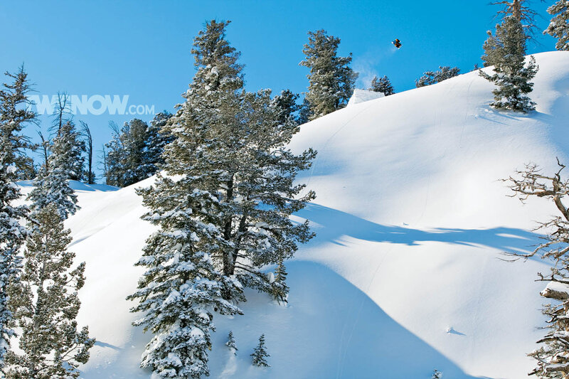 Snowboarder in mid-air jump