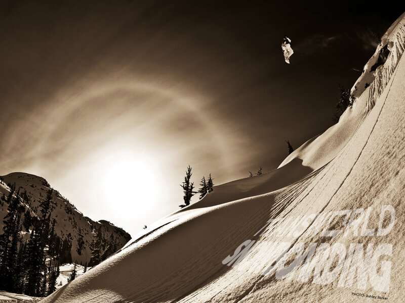 Snowboarder in mid-air jump