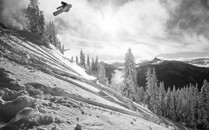 Snowboarder in mid-air jump