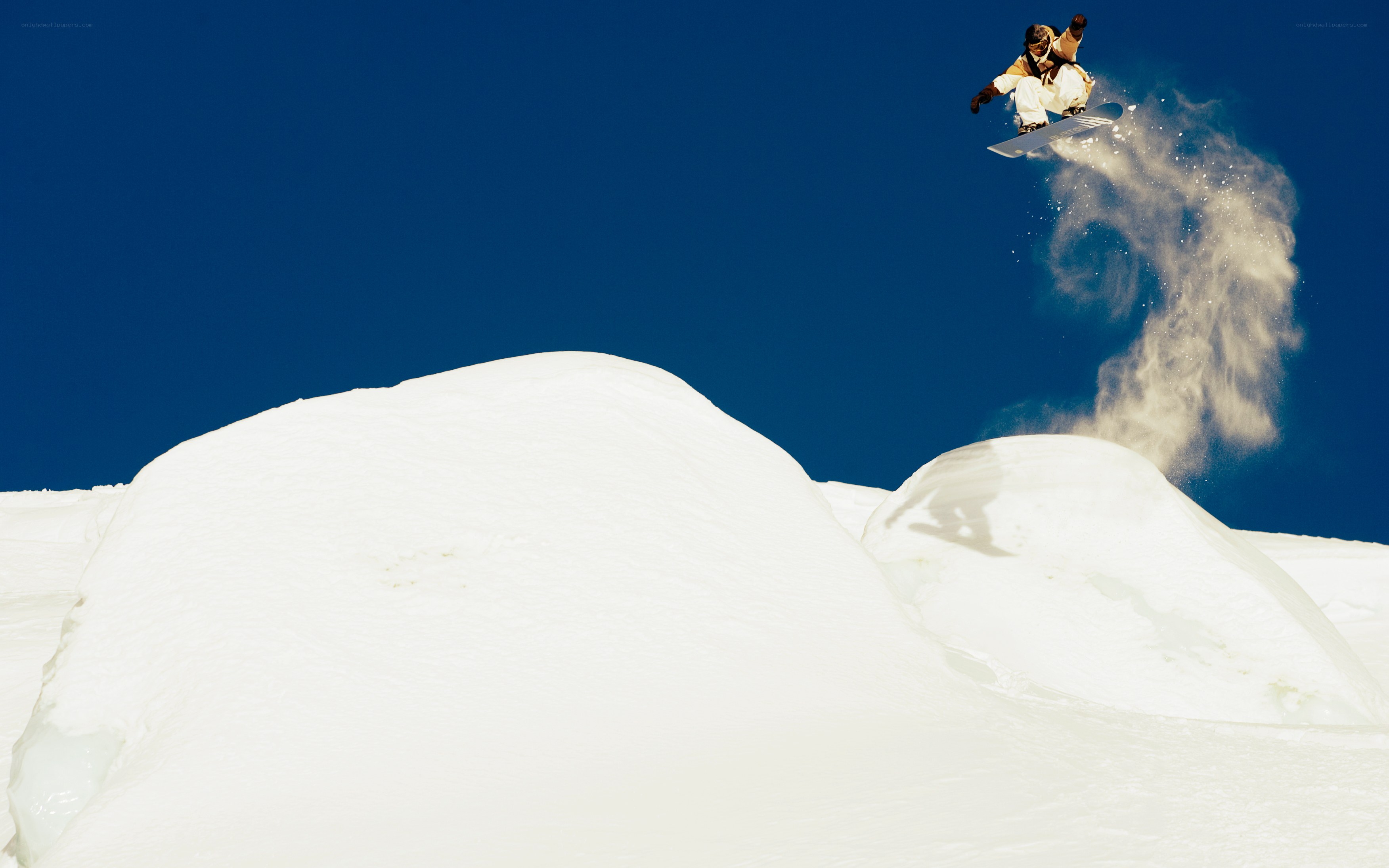 Snowboarder in mid-air jump