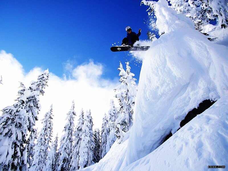 Snowboarder in mid-air jump