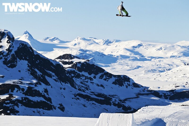 Snowboarder in mid-air jump